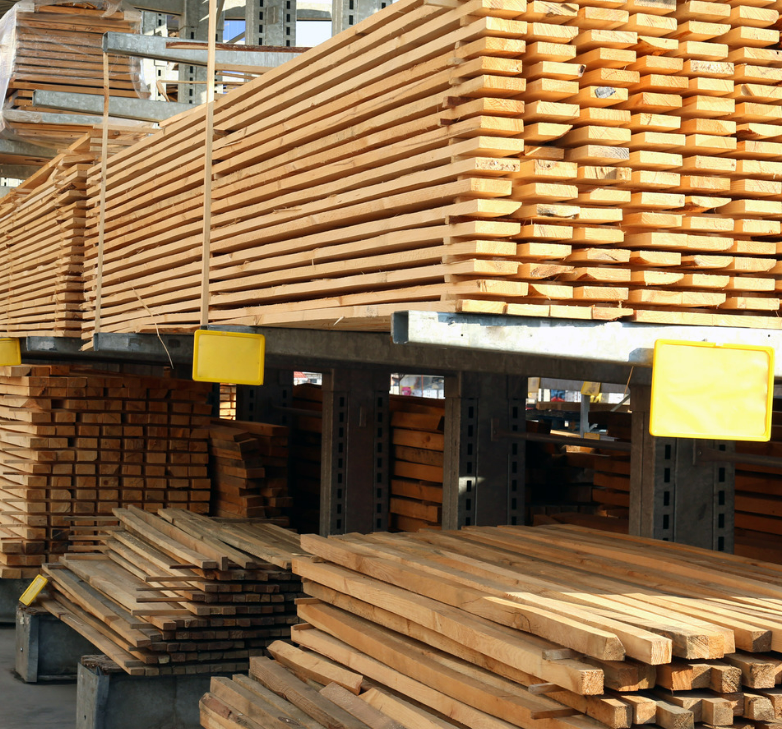 Stacks of wooden planks in a warehouse